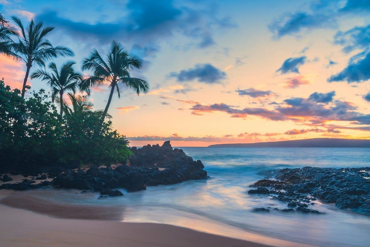 Maui coastline with lush green cliffs and turquoise water